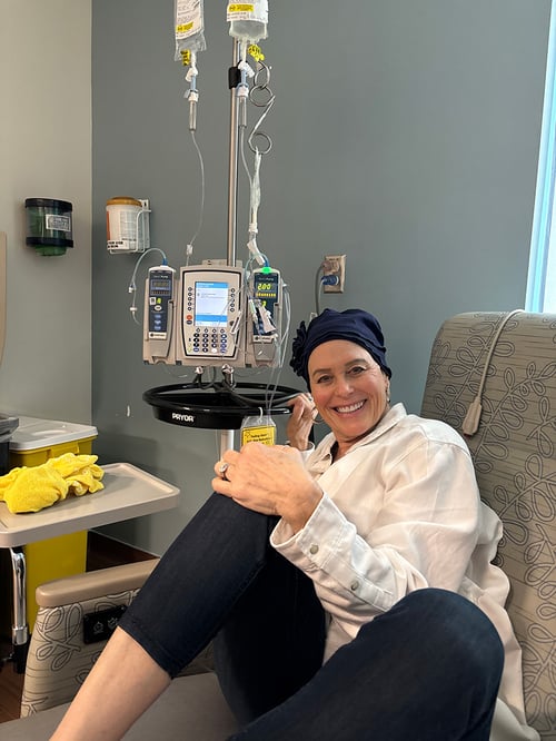 A picture of Club Pilates member Michelle L smiling while undergoing chemotherapy