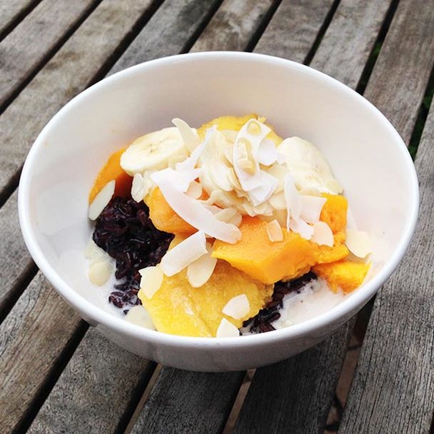 Coconut Black Rice Pudding with Flaked Almonds and Fruit